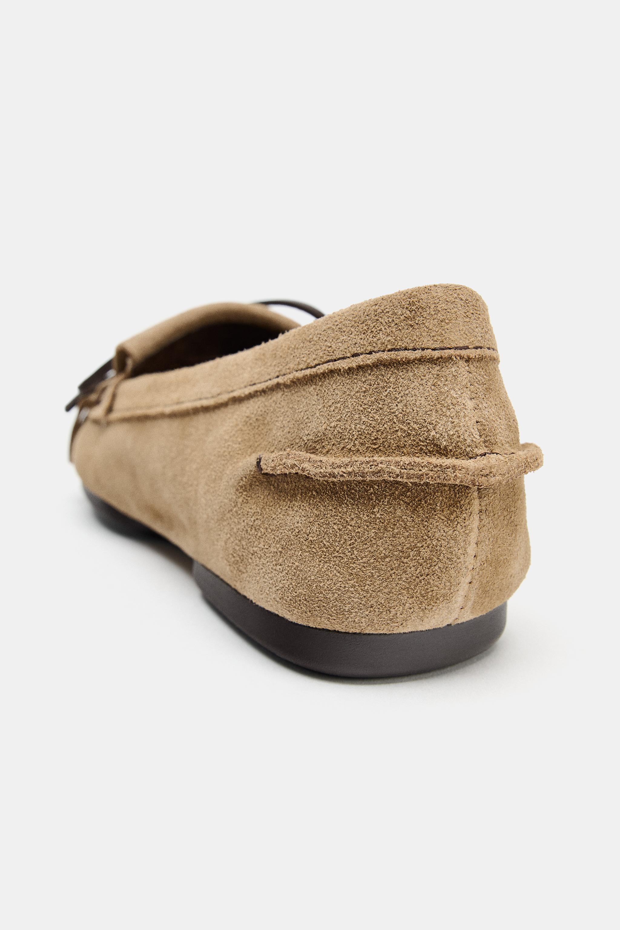 MOCASSINS EN CUIR À FRANGES